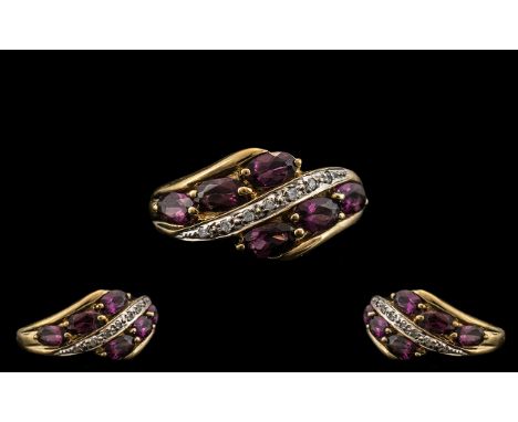 Ladies - 9ct Gold Attractive Amethyst and Diamond Set Dress Ring. Fully Hallmarked for 9.375. The Six Faceted Amethyst of Goo