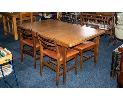 Teak Table With Pull Out Extending Leaf in the G Plan style, measures 57" in length, 35"width and 28" height.  Together with 