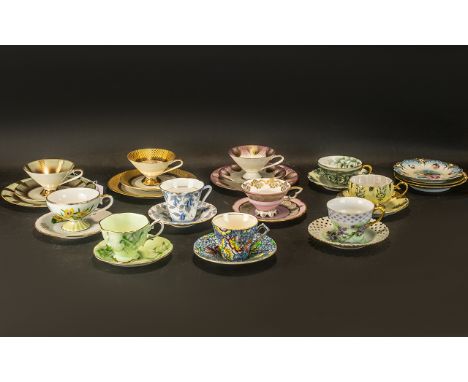 Three Trios of Art Deco Bavarian Porcelain, comprising cup, saucer and side plate in decorative patterns with gilt trims, all