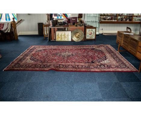 A Large Red Ground Persian Kashan Carpet traditional floral medallion.  Measures 356 x 251 cms.  Made in Iran.  Please see im