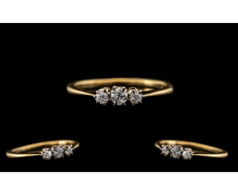 18ct Gold - Attractive 3 Stone Diamond Set Ring - Gallery Setting. The Old Cut Round Diamonds of Excellent Sparkle, Colour an