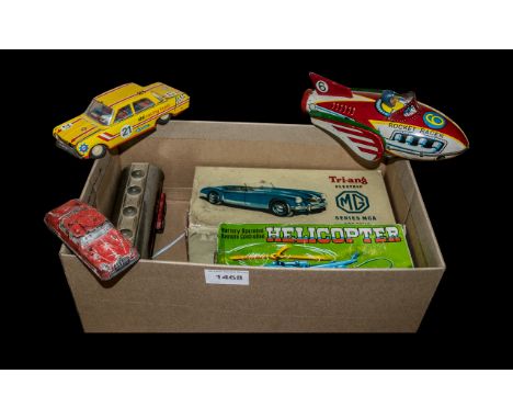 Collection of Vintage Toys.  Boxed helicopter, boxed Triang Electric MG, friction driven rocket, racing car and others.  All 