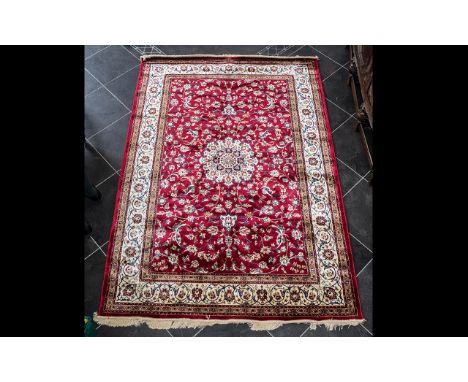 A Genuine Excellent Quality Cashmere Deep Red Ground Carpet/Rug. Decorated throughout with Sharbas Medallion design. As new c