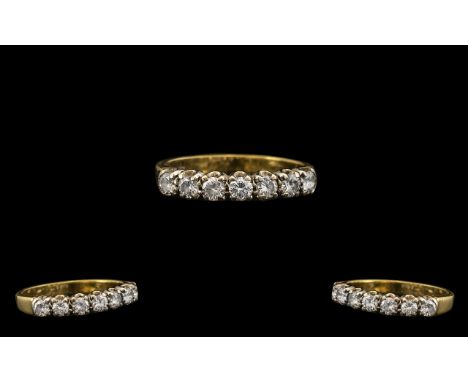 Ladies Attractive 18ct Gold Seven Stone Diamond Set Ring, the seven round brilliant cut diamonds, in the gallery setting, are