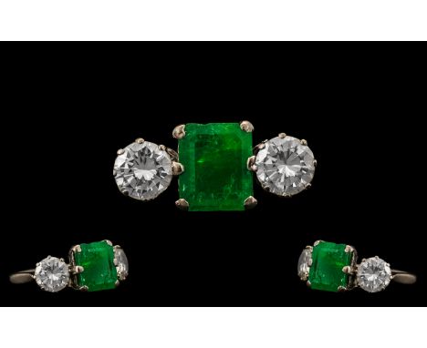 Platinum - 1930's Stunning 3 Stone Emerald and Diamond Set Dress Ring. The Central Step Cut Emerald Flanked by Two Round Bril