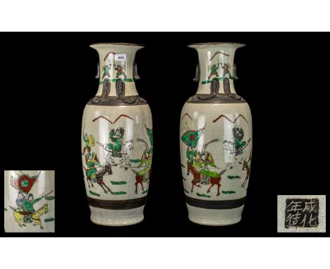 Chinese Crackled Glaze Vases of Large Size decorated in famille verte enamels, depicting warriors on horseback fighting, with