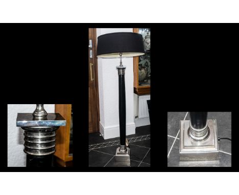 A Modern Contemporary Standard Lamp, black column with chrome fittings and large black shade.  Height including shade 64".