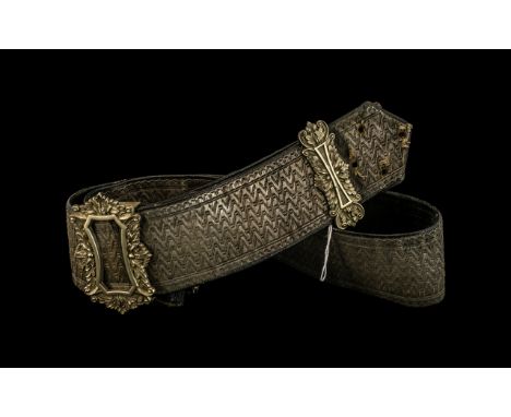 Antique Military Officer's Leather Sash with silver braid decorations applied, with a cast metal buckle.  Circa 1800s.  33" i