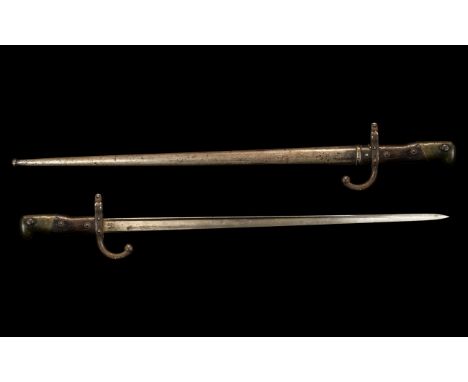 French 19th Century Sword Bayonet with Scabbard, script to edge of blade 'St. Etienne Fevrier 1883'.  Number to hilt 96289, m