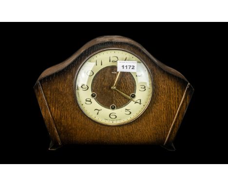 1950s Smith's Oak Case Mantle Clock with an enamel chapter ring and a 3 keyhole wind, for Westminster Chimes.  Working order.