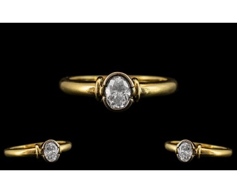 18ct Gold Superb Quality Pave Set Single Stone Diamond Ring of Excellent Contemporary Design. The Oval Shaped Faceted Diamond