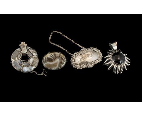 Antique Period Good Quality Pair of Polished Scotch Pebble Silver Mounted Brooches, circa 1900.  Size 2.5" x 2" - 6.25 cm x 5