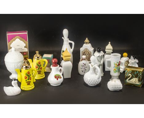 Collection of Vintage Avon White Glass Perfume Bottles, comprising: two Oriental Moonwind bottles; tall stoppered bottle with