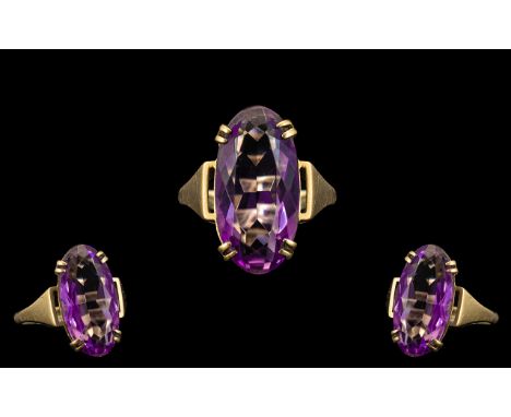 Ladies 9ct Yellow Gold Single Stone Amethyst Set Dress Ring, Raised on Open Worked Setting. Fully Hallmarked for 9.375. The O