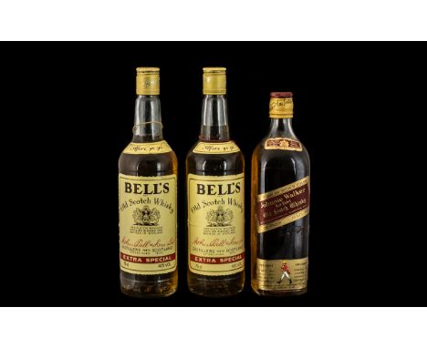 Two Bottles of Bells Old Scotch Whisky and a Johnnie Walker Red Label Old Scotch Whisky 70% proof.