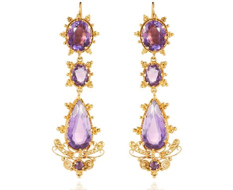 A PAIR OF ANTIQUE AMETHYST EARRINGS in high carat yellow gold, each comprising of two oval cut amethysts, suspending a furthe