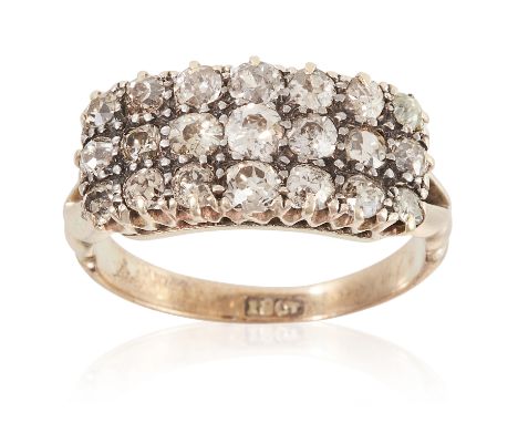 AN ANTIQUE DIAMOND DRESS RING in 18ct yellow gold, set with three rows of round cut diamonds totalling approximately 1.05 car