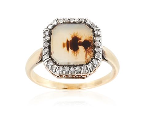 AN ANTIQUE DENDRITIC AGATE AND DIAMOND RING in yellow gold and silver, set with an octagonal piece of polished agate encircle