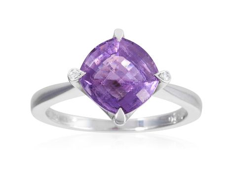 AN AMETHYST AND DIAMOND DRESS RING, CARTIER in 18ct white gold, set with a faceted amethyst and two diamond sparks, signed Ca