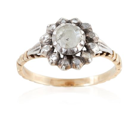 AN ANTIQUE DIAMOND CLUSTER RING, DUTCH 19TH CENTURY in yellow gold and silver, set with a cluster of rose cut diamonds, to a 