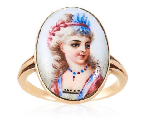 AN ANTIQUE MINIATURE RING in yellow gold, depicting a miniature of a lady, unmarked, size I / 4, 4.0g.