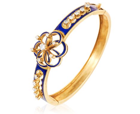 A DIAMOND AND ENAMEL BANGLE in 18ct yellow gold jewelled with round cut diamonds totalling 0.75 carats, within a dark blue en