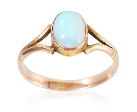 AN OPAL DRESS RING in yellow gold, set with an oval cabochon opal to a bifurcated band, unmarked, size N / 6.75, 1.6g.