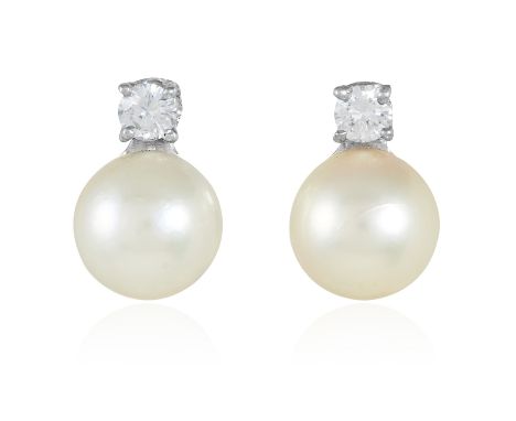 A PAIR OF PEARL AND DIAMOND EAR STUDS in 18ct white gold, each comprising of a round cut diamond above a pearl, stamped 750, 