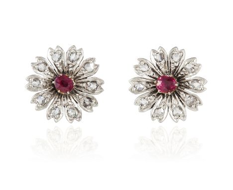 A PAIR OF RUBY AND DIAMOND EARRINGS in yellow gold, in floral design, set with an old cut ruby and rose cut diamonds, unmarke