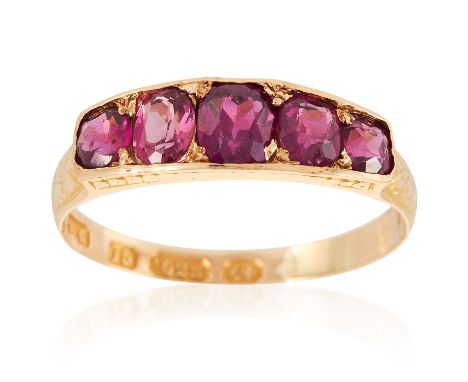 AN ANTIQUE FIVE STONE GARNET RING in 15ct yellow gold, set with five cushion cut garnets, British hallmarks, size P / 7.5, 2.