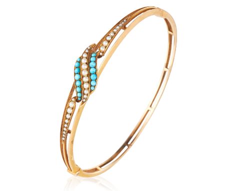 AN ANTIQUE TURQUOISE AND PEARL BANGLE in 15ct yellow gold, set with pearls and cabochon turquoise in swirling design, unmarke