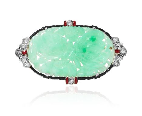 AN ART DECO JADEITE JADE, DIAMOND AND ENAMEL BROOCH in yellow gold, set with a carved jade plaque, in a border of enamel and 