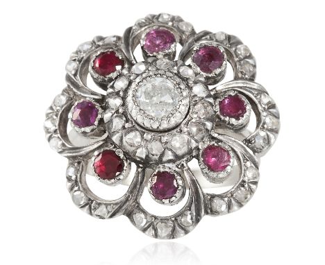 AN ANTIQUE DIAMOND AND RUBY RING, DUTCH 19TH CENTURY in yellow gold and silver, concentric rows of rubies and diamonds around