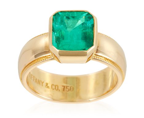 A 2.85 CARAT COLOMBIAN EMERALD RING, TIFFANY &amp; CO in 18ct yellow gold, set with a step cut emerald of approximately 2.85 