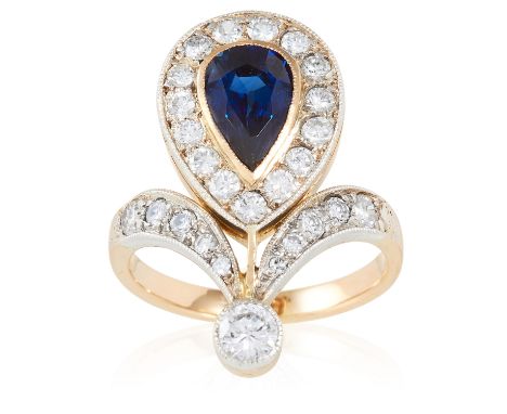 A SAPPHIRE AND DIAMOND RING in 18ct gold, the pear cut sapphire of 1.75 carats encircled and accented by diamonds totalling 1