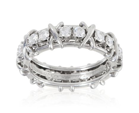 A 1.80 CARAT DIAMOND ETERNITY RING, SCHLUMBERGER FOR TIFFANY in platinum, set with round cut diamonds totalling approximately