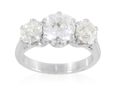 A 3.33 CARAT DIAMOND THREE STONE RING in platinum or white gold, the three old cut diamonds of approximately 1.54, 0.92 and 0