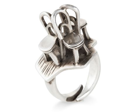 A SILVER RING, GEORG JENSEN in sterling silver, depicting three chairs, stamped 925, size M / 6, 12.2g.