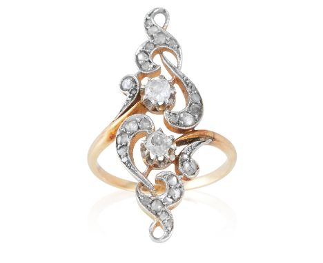 AN ANTIQUE DIAMOND RING in yellow gold, the elongated face with scrolling openwork design, jewelled with old and rose cut dia