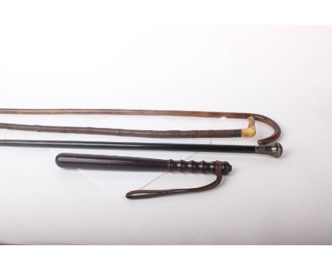 A silver top walking stick, 2 others and a truncheon (4)