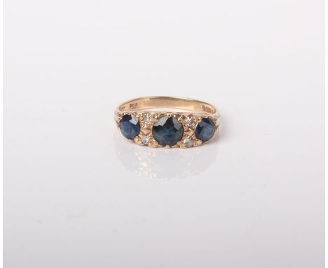 A modern 9ct gold, sapphire and diamond carved half-hoop style ring, circa 1973, size M, 2.8g gross