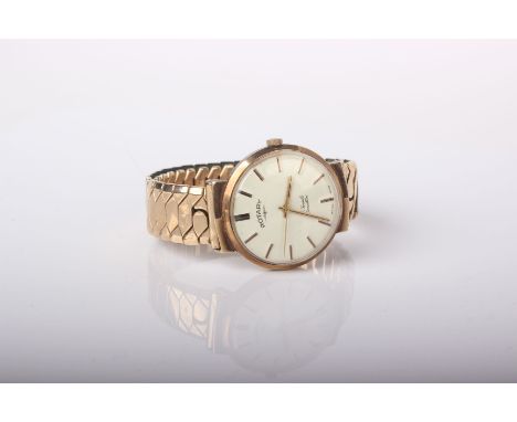 Rotary, a gentleman’s 9ct gold cased round bracelet watch, circa 1963, cream dial with raised baton numerals and hands, two p