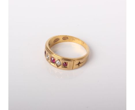 An early 20th century gold, ruby and diamond five stone gypsy ring, stamped ‘18’, maker’s mark ‘C.G’, 3.6g