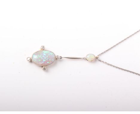 A gold, white opal and diamond drop pendant, top opal approx 6mm x 4mm with platinum fronted bar to an oval opal 17mm x 12mm 