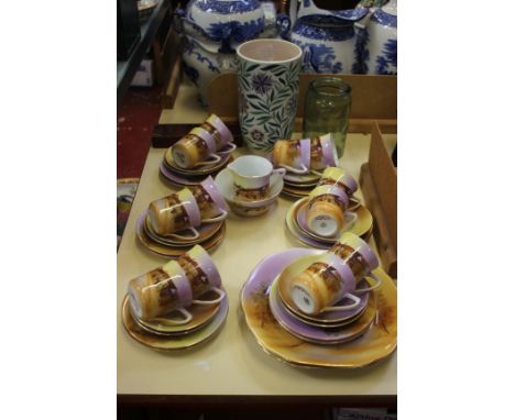 A thirty piece Czech Victoria 'Old England' handpainted tea set, a Poole vase and other items