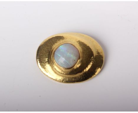 A white opal oval brooch marked '750', 14.7g gross