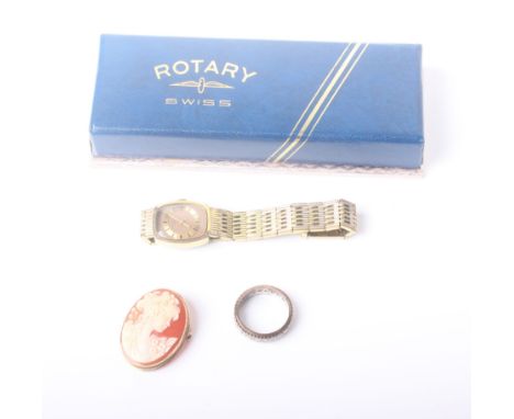 A 9ct gold cameo brooch, a silver coloured eternity ring set with simulated diamonds and a gold coloured Rotary wristwatch, i