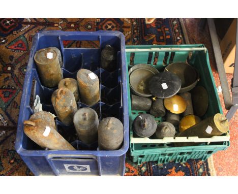 Thirteen longcase clock weights, four bells, four pendulum bobs and four wall clock weights (Two boxes)