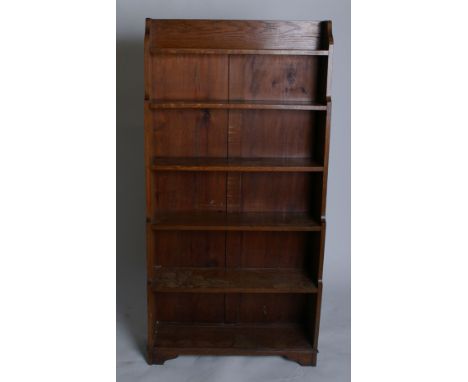 A 1930's 6 shelf waterfall open bookcase, height 154cm width 76cm