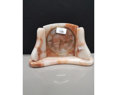A MARBLE AND BRASS EFFECT MANTLE CLOCK